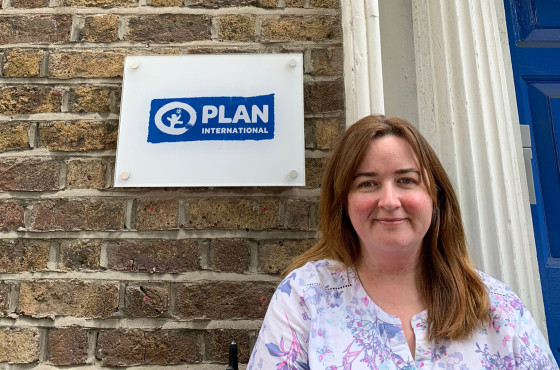 Clare McPhilips in front of the Plan Ireland office