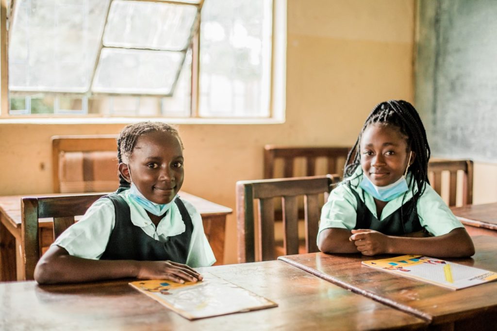 Girls learn about their rights at their school club.
